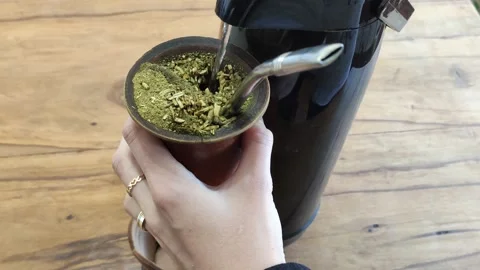 Filling yerba mate tea with hot water Stock Footage 158777232