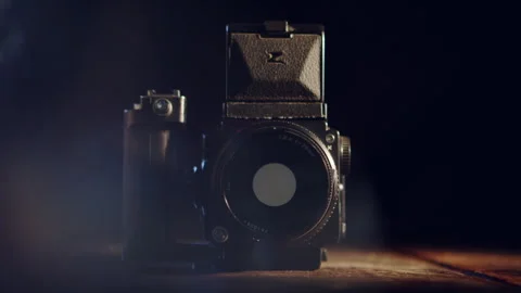 Film camera on a table Stock Footage 278837424