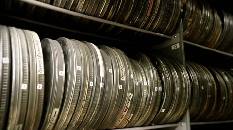 Film cans on a shelf Stock Footage