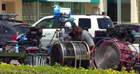 Film crew working behind the scenes shooting action movie in Los Angeles, 4K Stock Footage 213668474