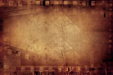 Film negative frames on brown background Stock Photos