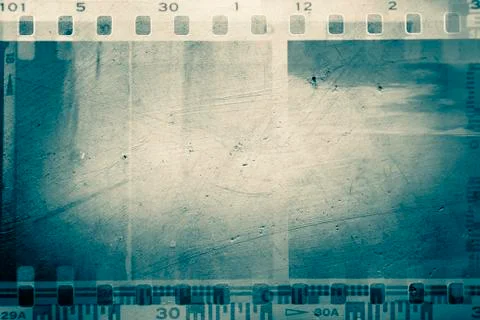 Film negative frames on rough background Stock Photos