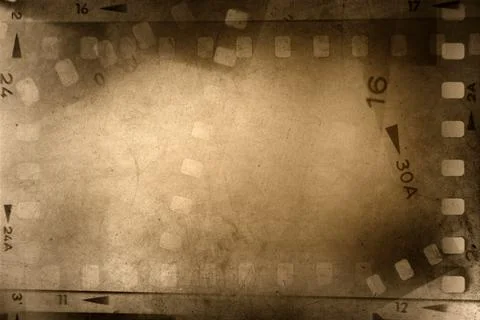 Film negatives frames brown background. Stock Illustration