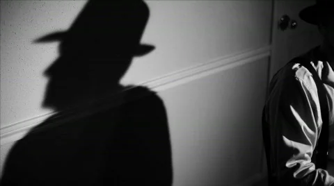 Film noir pan right reporter typing Stock Footage