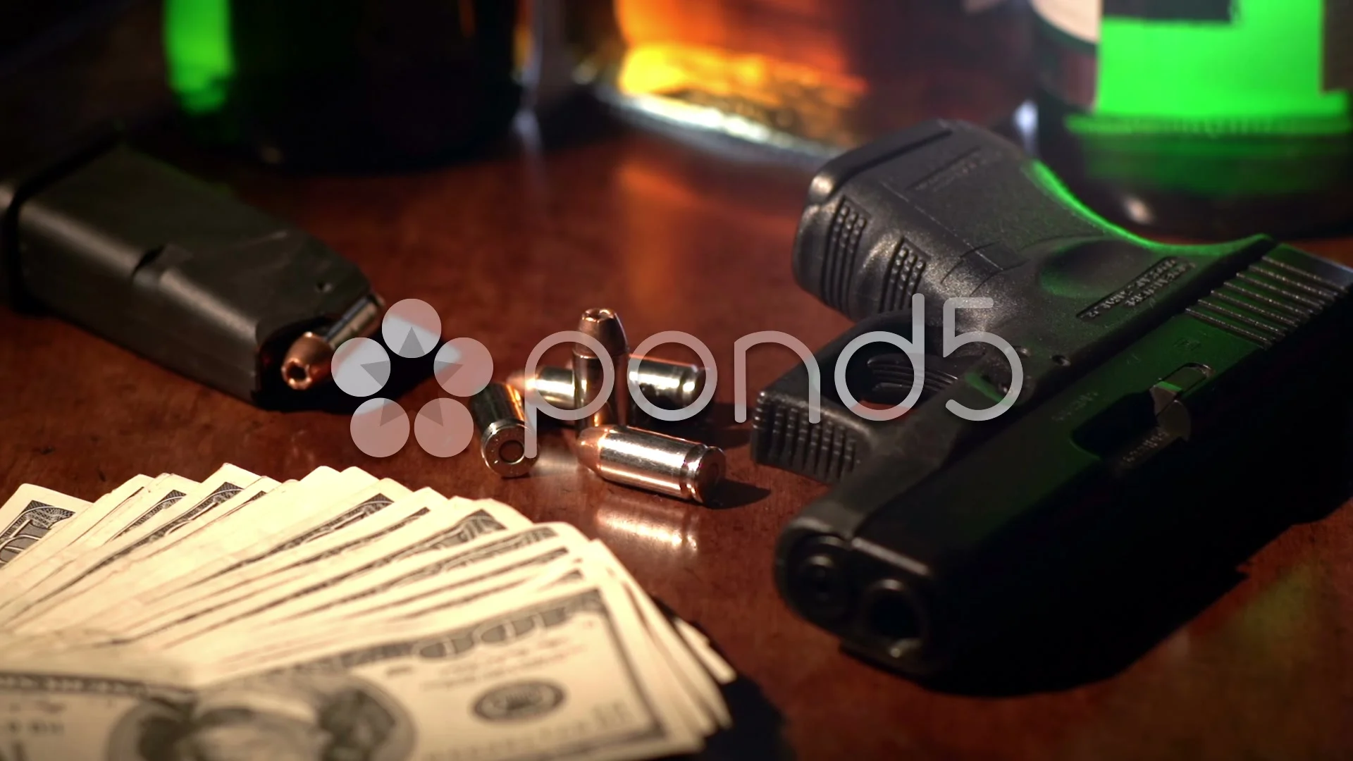 Film noir shot of a gun, bullets, alcohol and 100 dollar bills