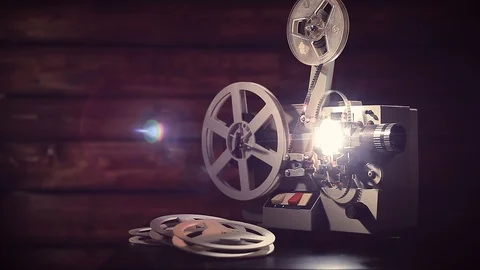 Film projector on a black background with dramatic lighting and selective focus. 動画素材 97922741