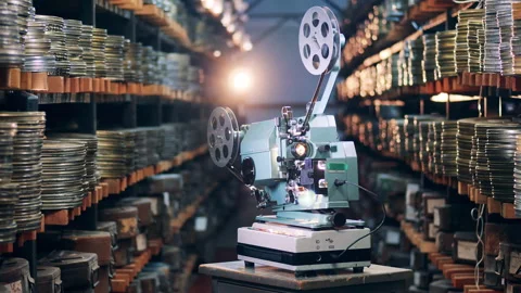 Film projector at work in the archive facility Vídeo Stock 147237715