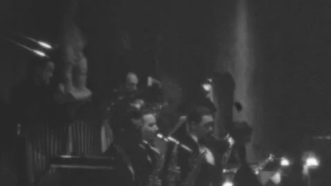 From a film reel captures a live performance of a big band jazz orchestra on a Stock Footage 341901129