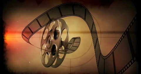 Film rolling out of a film reel Stock Footage