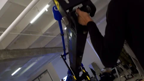 Film technicians assemble camera jib for overhead shots Stock Footage 308952573