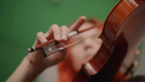 Film violin session. Violin performance captured with motion effects. Cinematic Stock Footage 346555745