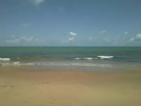 Filming the beach, rocks, sun, clouds and ocean waves, very beautiful! Stock Footage 163683863