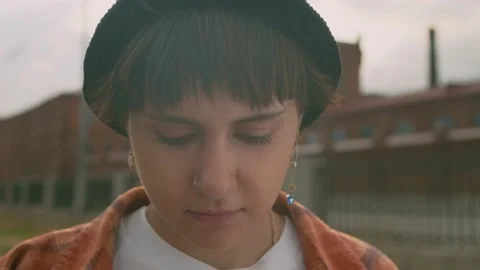 Filming of a beautiful dark haired young girl putting protective medical mask on Stock Footage 157608690