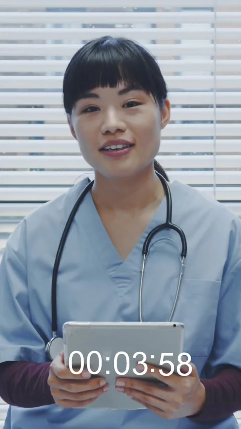 Filming a doctor on a digital camera 4k Stock Footage 324434861