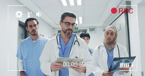 Filming doctors on a digital camera 4k | Stock Video | Pond5