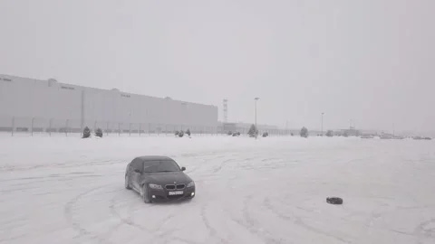 Filming of driving a car under a light snowfall. Stock Footage 147491912