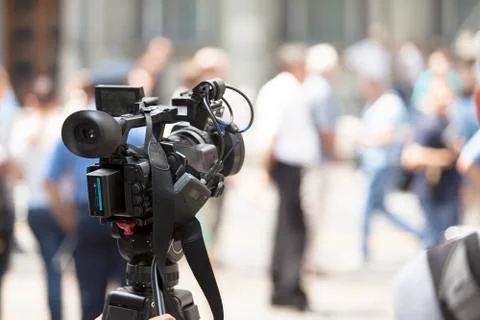 Filming an event with a video camera Stock Photos