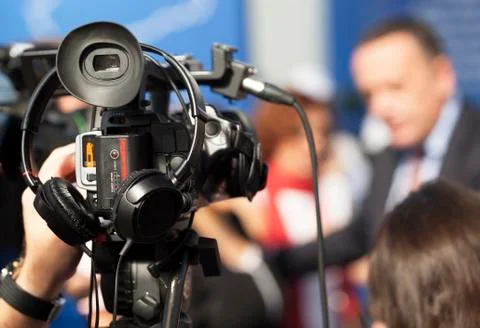 Filming an event with a video camera Stock Photos