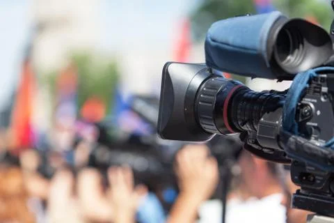 Filming an event with a video camera Foto stock