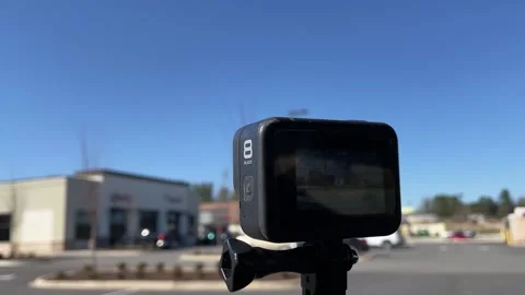 Filming with a GoPro 8 Black using the official GoPro suction cup on a car wi Stock Footage 147417479
