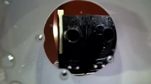 Filming inside plastic cup pouring clear soda water drink with bubbles young man Stock Footage 137540194