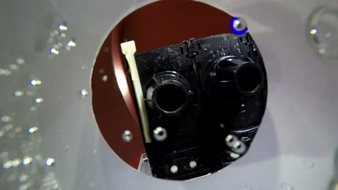 Filming from the inside of plastic cup on young man pouring clear soda water dri Stock Footage 137540231