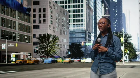 Filming news segment, street interviewer in city center, using microphone Stock Footage 334168527