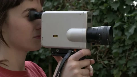 Filming with Nizo Super 8mm camera 2 Stock Footage 202580845