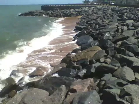 Filming the ocean waves from above, it hit the rocks, very beautiful Stock Footage 163684274