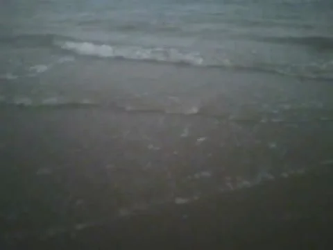 Filming the ocean waves almost at night, you can see the moon's reflection Stock Footage 160233234