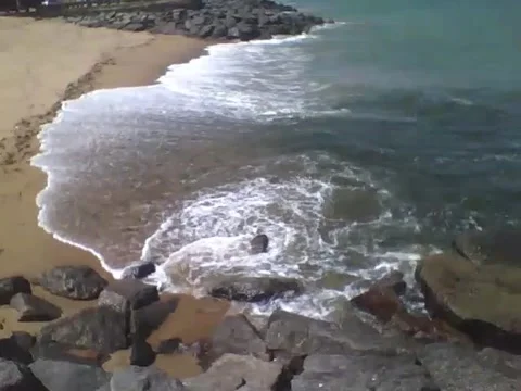 Filming the ocean waves on the beach from above, very beautiful! Stock Footage 163684316