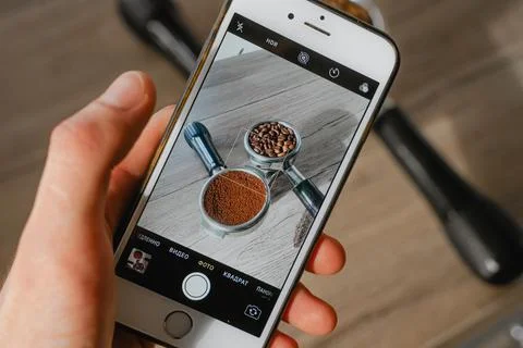 Filming the process of preparing a coffee drink on a smartphone 写真素材