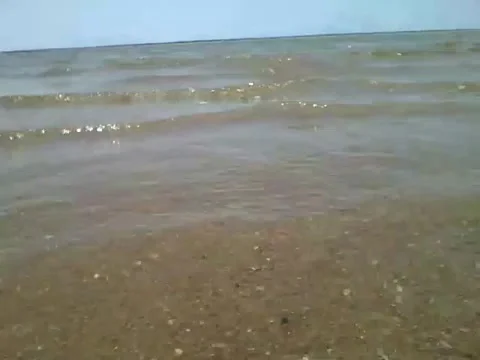 Filming the sea close, small waves and a beautiful horizon Stock Footage 162147218