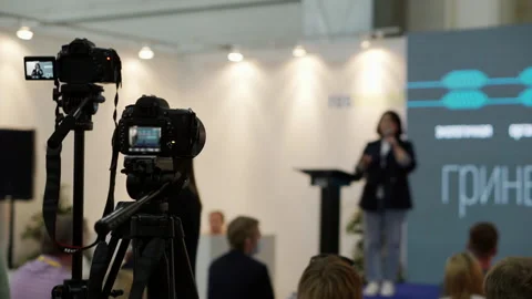 Filming of the speaker's speech at the presentation of a new product. Stock Footage 157458699