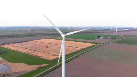 Filming windmill with beautiful background landscape 4K Stock Footage 91275800