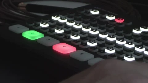 Filmmaker Using Professional Editing Console to Edit Video Footage Stock Footage 348125881
