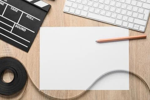 Filmmaking and screenwriting creative process with clapperboard film reel key Stock Photos