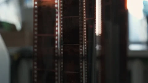 Films hang and dry in the development lab Stock Footage 125812028
