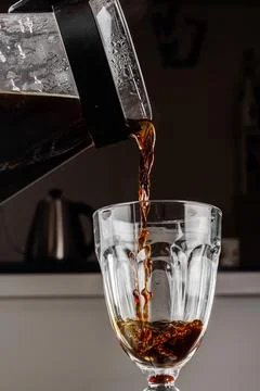 Filter coffee brewing on black background. Pour-over alternative method of .. Stock Photos