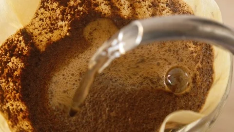 Filter coffee making process closeup pouring water Stock-Footage 120995167