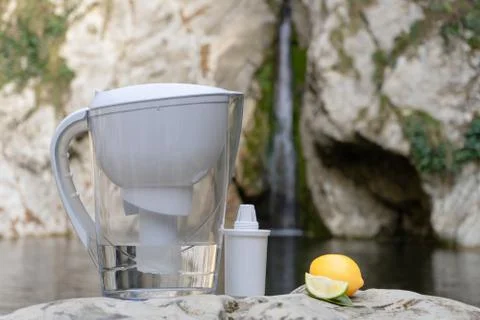 Filter jug and extra filter for safe drinking water on the background of a mo Stock Photos