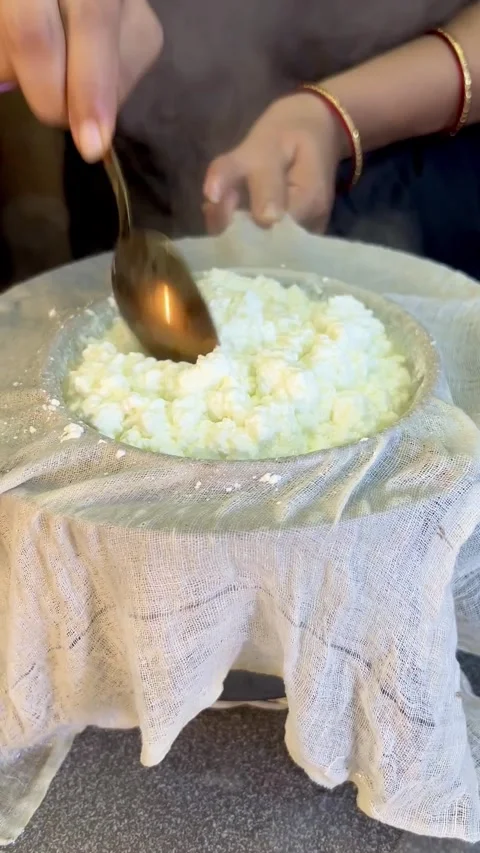 Filter outing Cottage cheese from curd in a bowl isolated on white background. Stock Footage 287177536