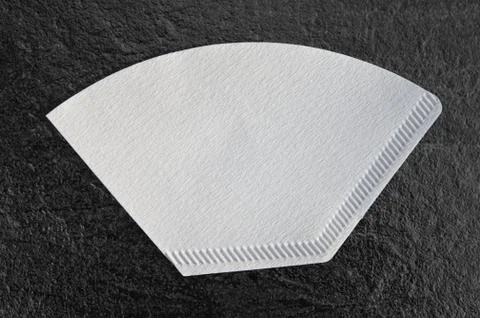 Filter Papers.isolated on a dark table background with clipping path For all Stock Photos