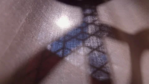 Filtered sunlight casting geometric window shadow on translucent curtain fa.. Stock Footage 314607881