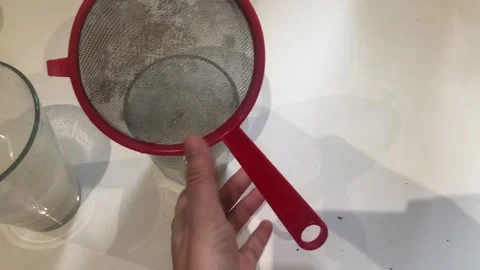 Filtering Beige Beverage Into Glass Experimental Drink Preparation Stock-Footage 332725581