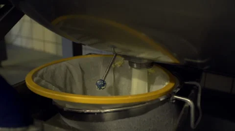 Filtering the butter from the milk Stock Footage 35179163