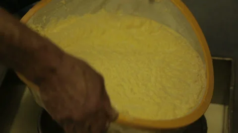 Filtering the butter from the milk Stock Footage 35331146