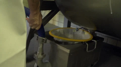 Filtering buttermilk Stock Footage 35179173