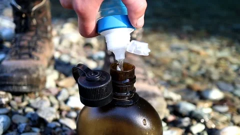 Filtering water - Katadyn Befree Stock Footage 154769349