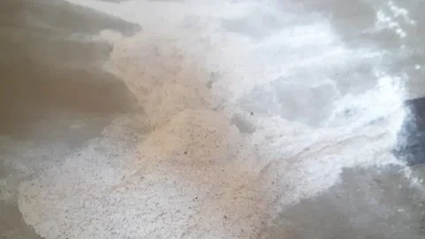 Final Cleaning of Ragi Flour by Hand on Cloth for Smooth Texture Video stock 333909390